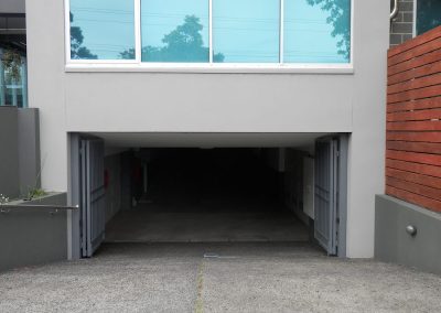Basement Garage Bi-Fold Door – Mentone