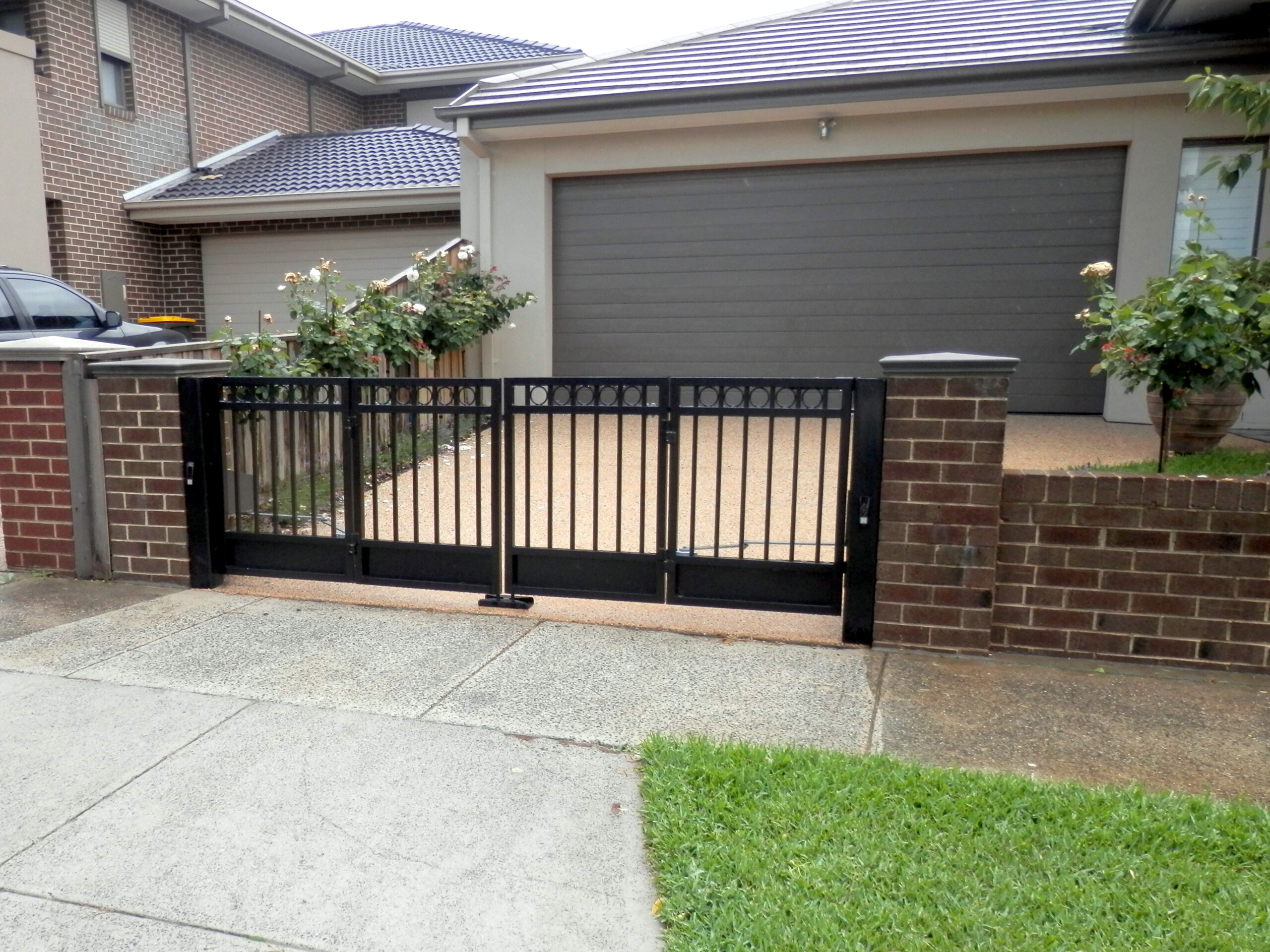The Motorised Gate Company Hawthorn East Trackless Bi-Fold Swing Gates