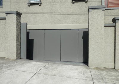 Vertical Bi-Fold Garage Doors